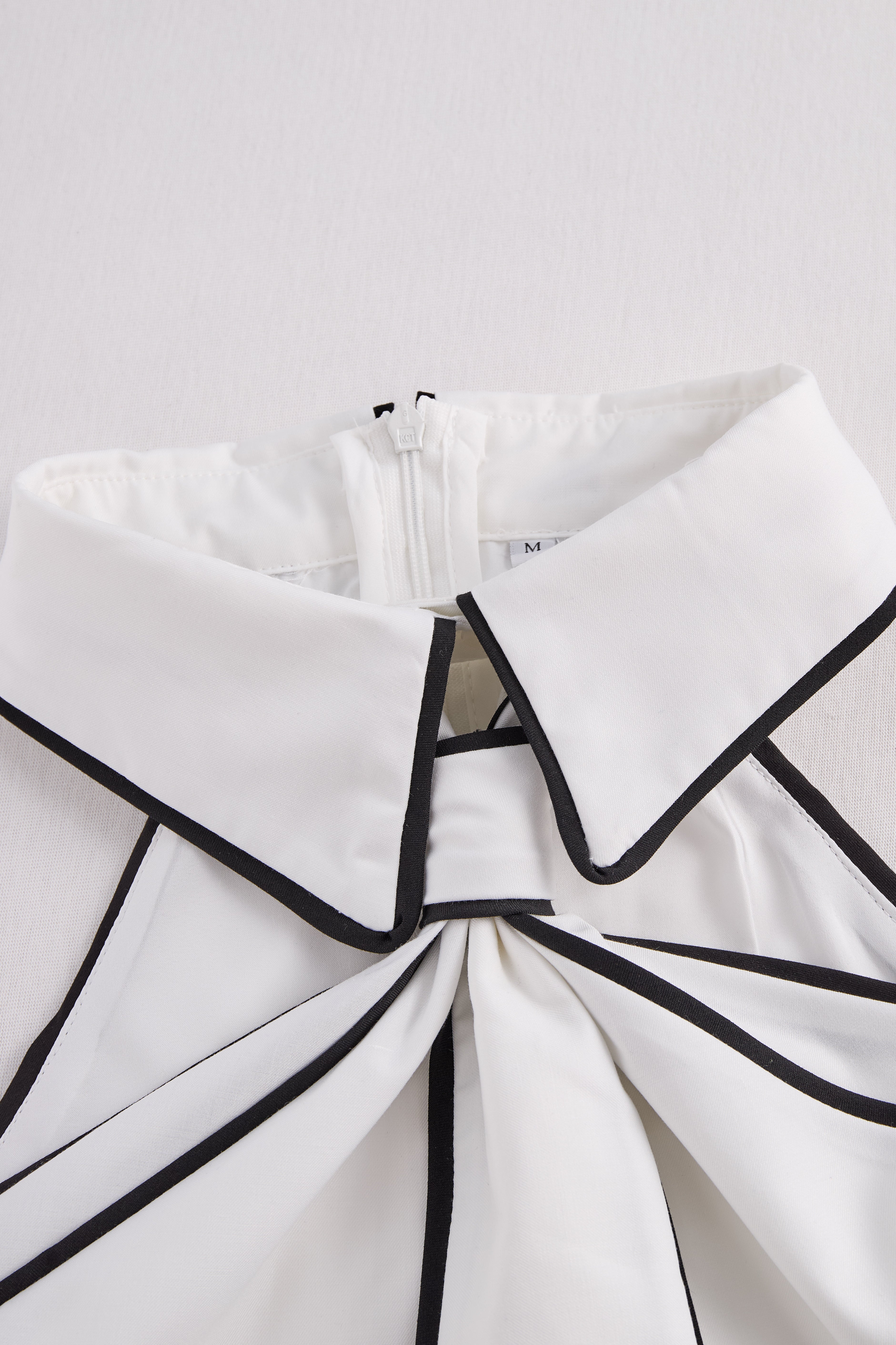 Stylish Sleeveless Halter Neck Blouse With Bold Contrast Trim | Elegant Women's Dress