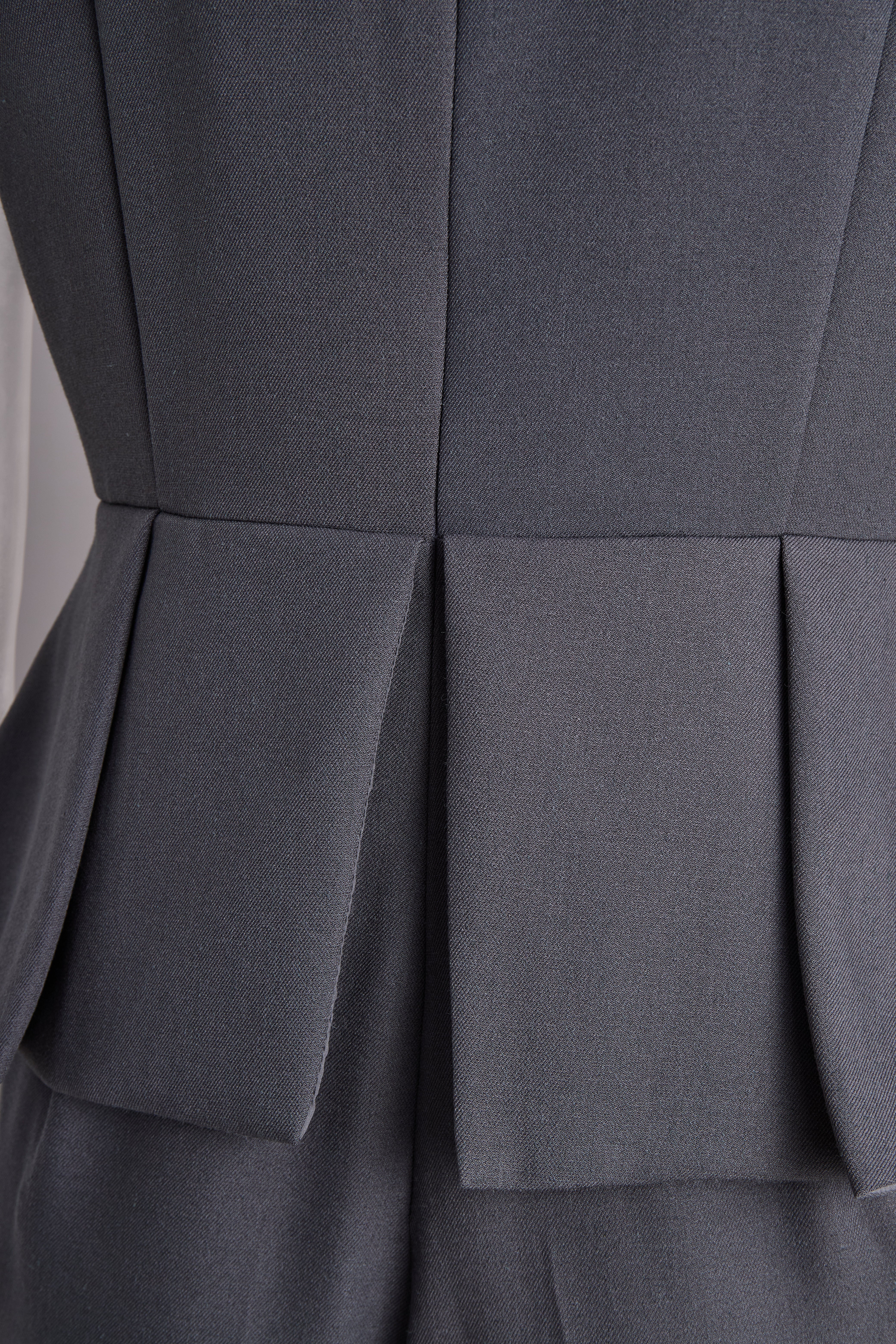 Sophisticated Sleeveless Peplum Jumpsuit In Charcoal Gray | Elegant Women's Dress