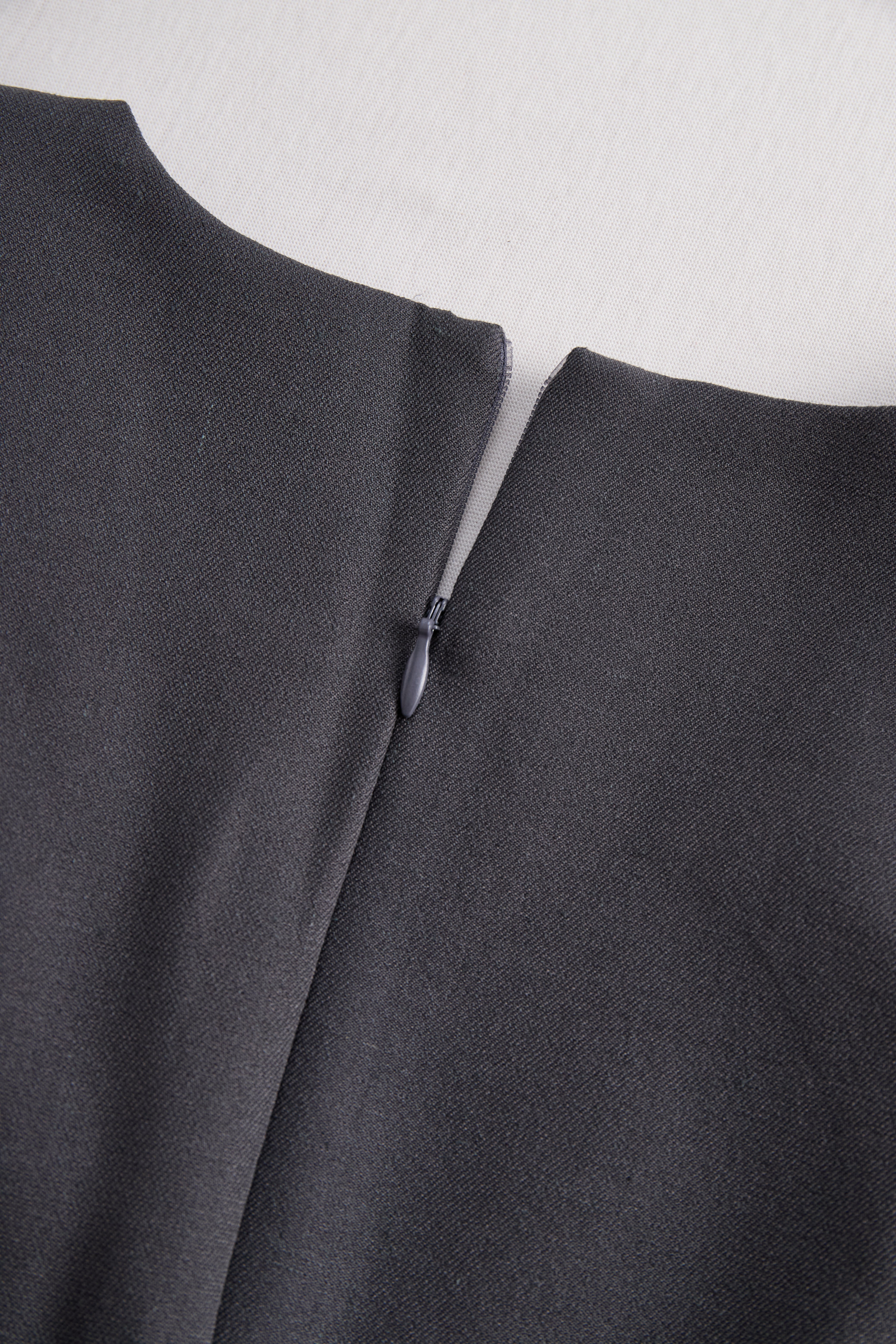 Sophisticated Sleeveless Peplum Jumpsuit In Charcoal Gray | Elegant Women's Dress