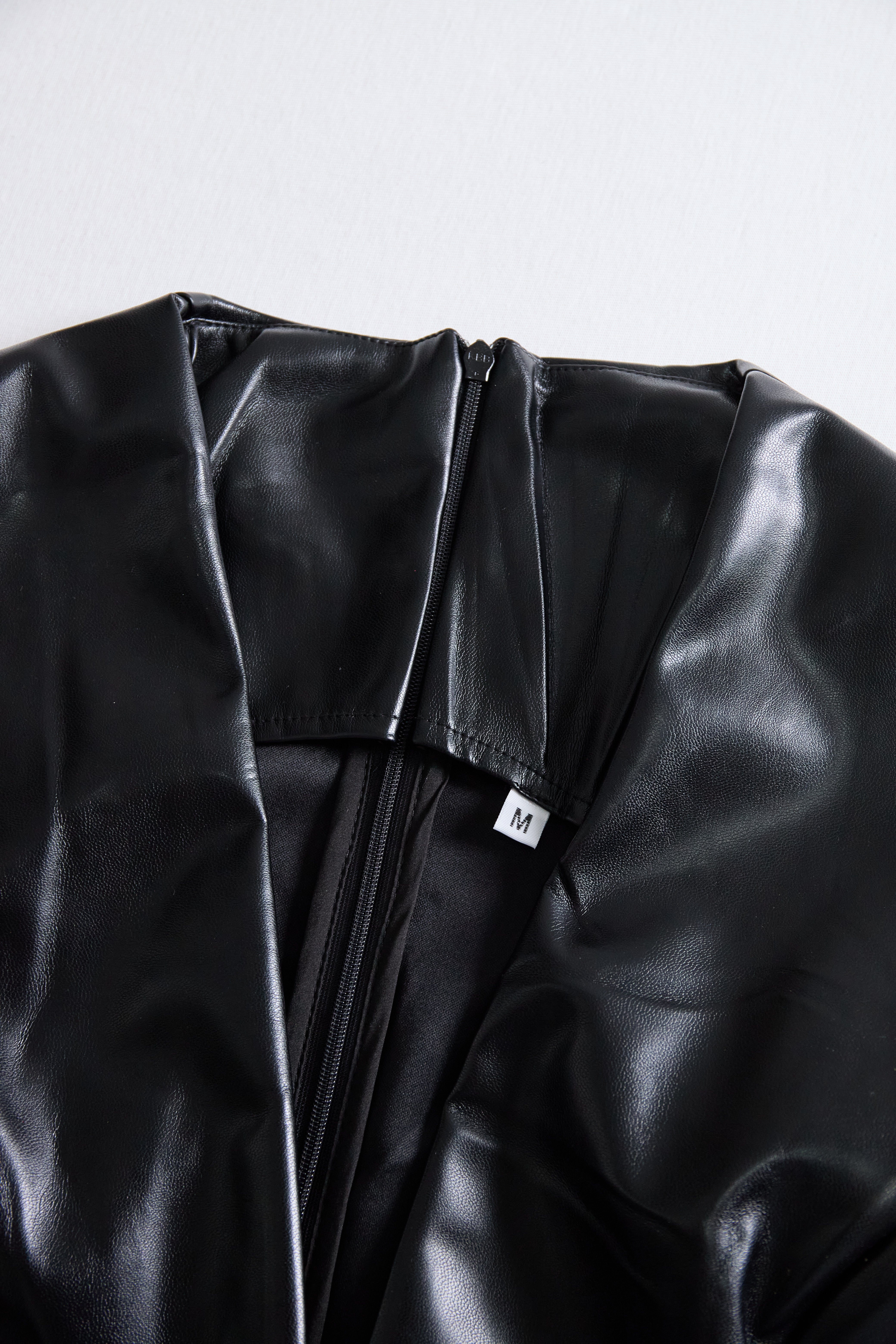 Sleek Black Faux Leather Sleeveless Midi Dress | Elegant Women's Dress