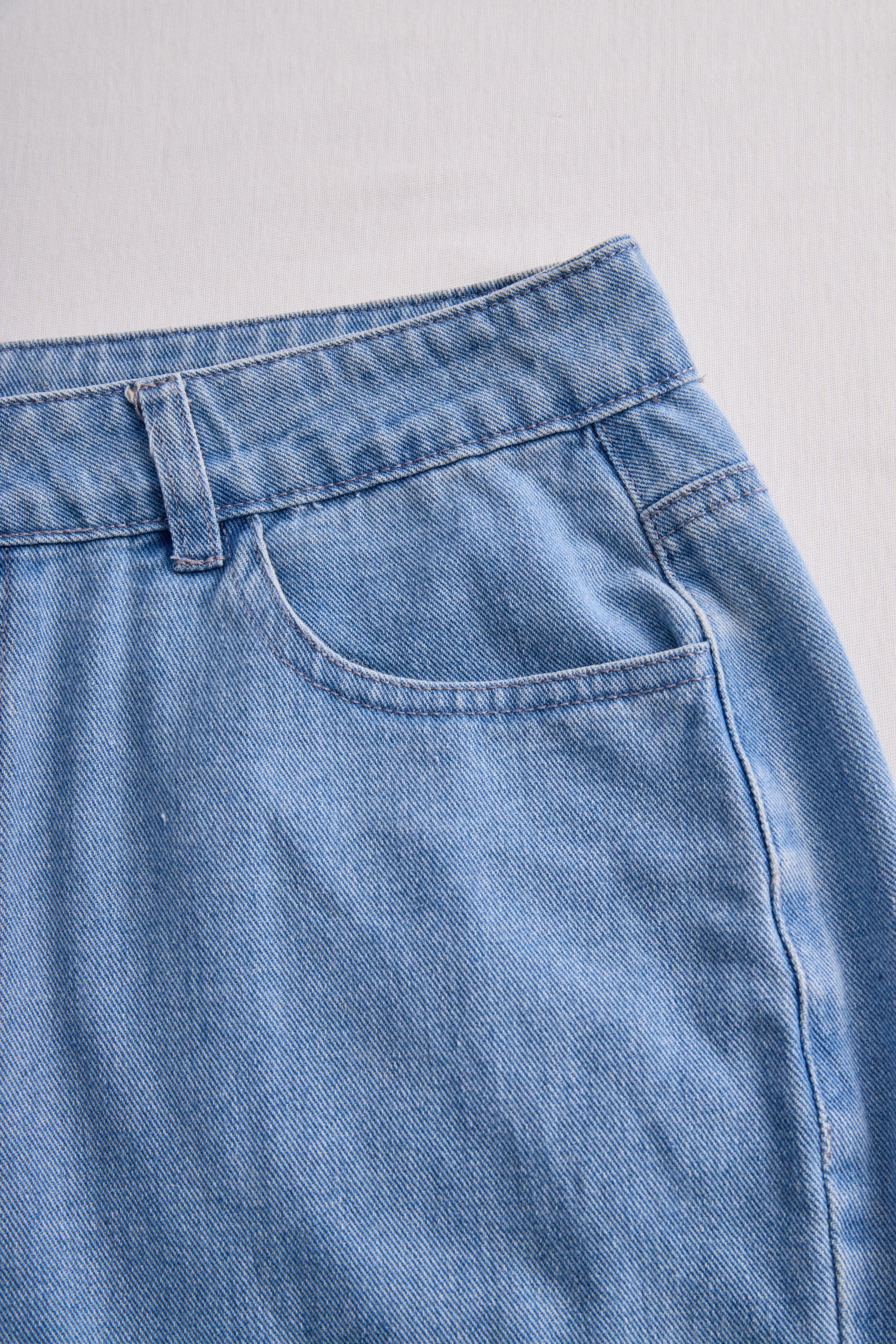 Stylish Denim Two-Piece Set With Asymmetrical Top And Fringed Skirt | Elegant Women's Dress